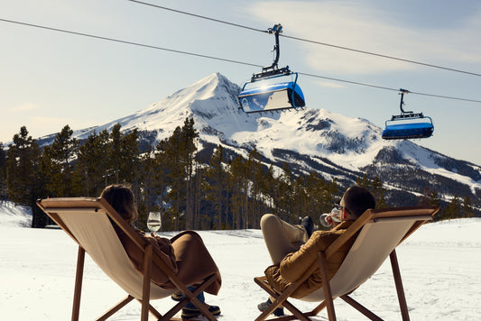 An outdoor terrace at Big Sky Resort, with Lone Peak above.