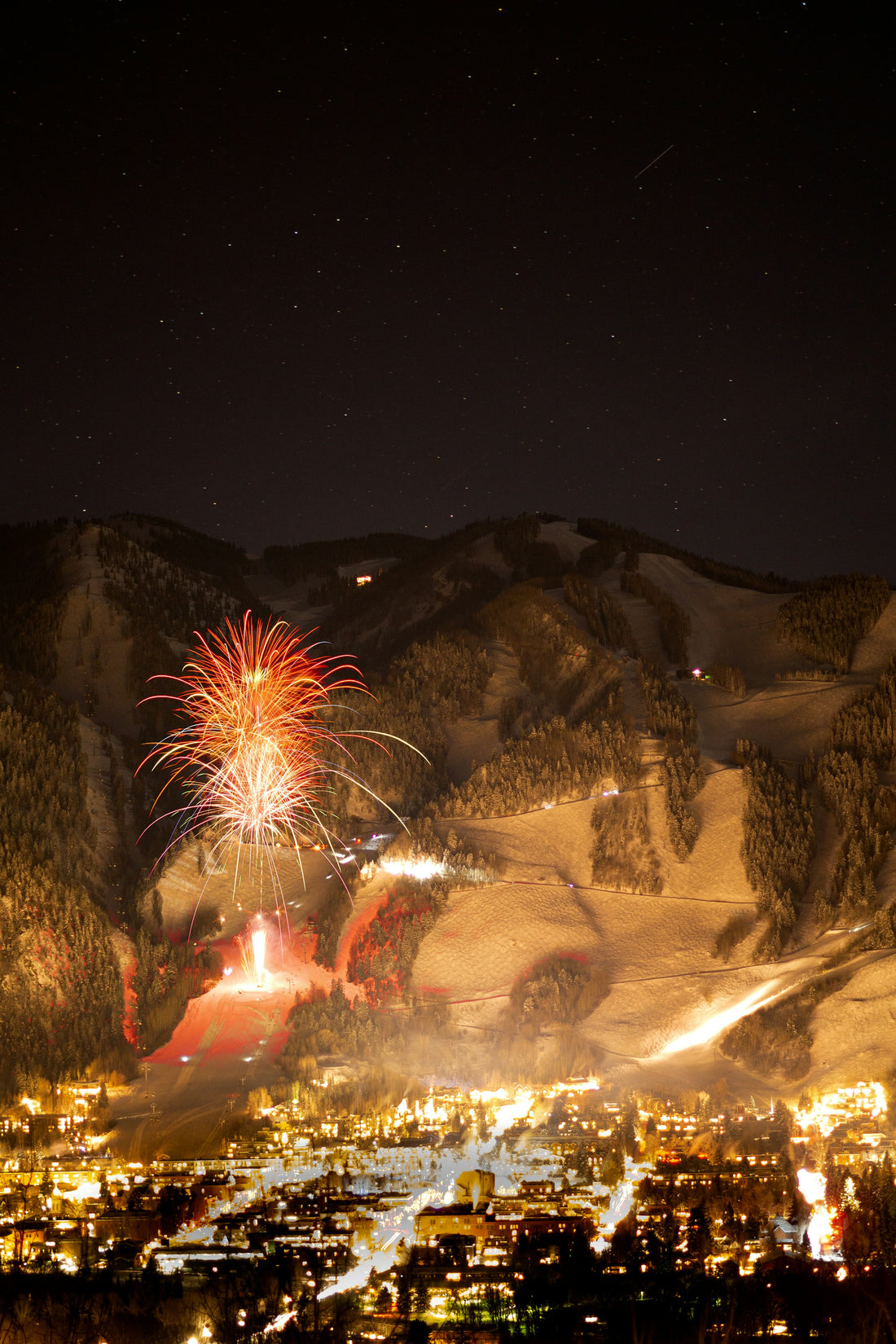 Fireworks above snow-covered Aspen.