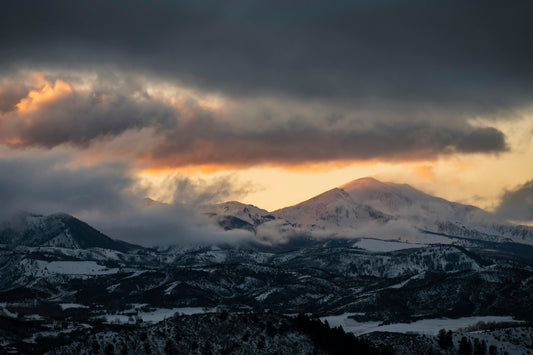 Snow-covered peaks at sunset.