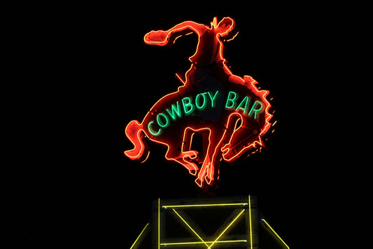 The Million Dollar Cowboy Bar sign in Jackson, Wyoming.
