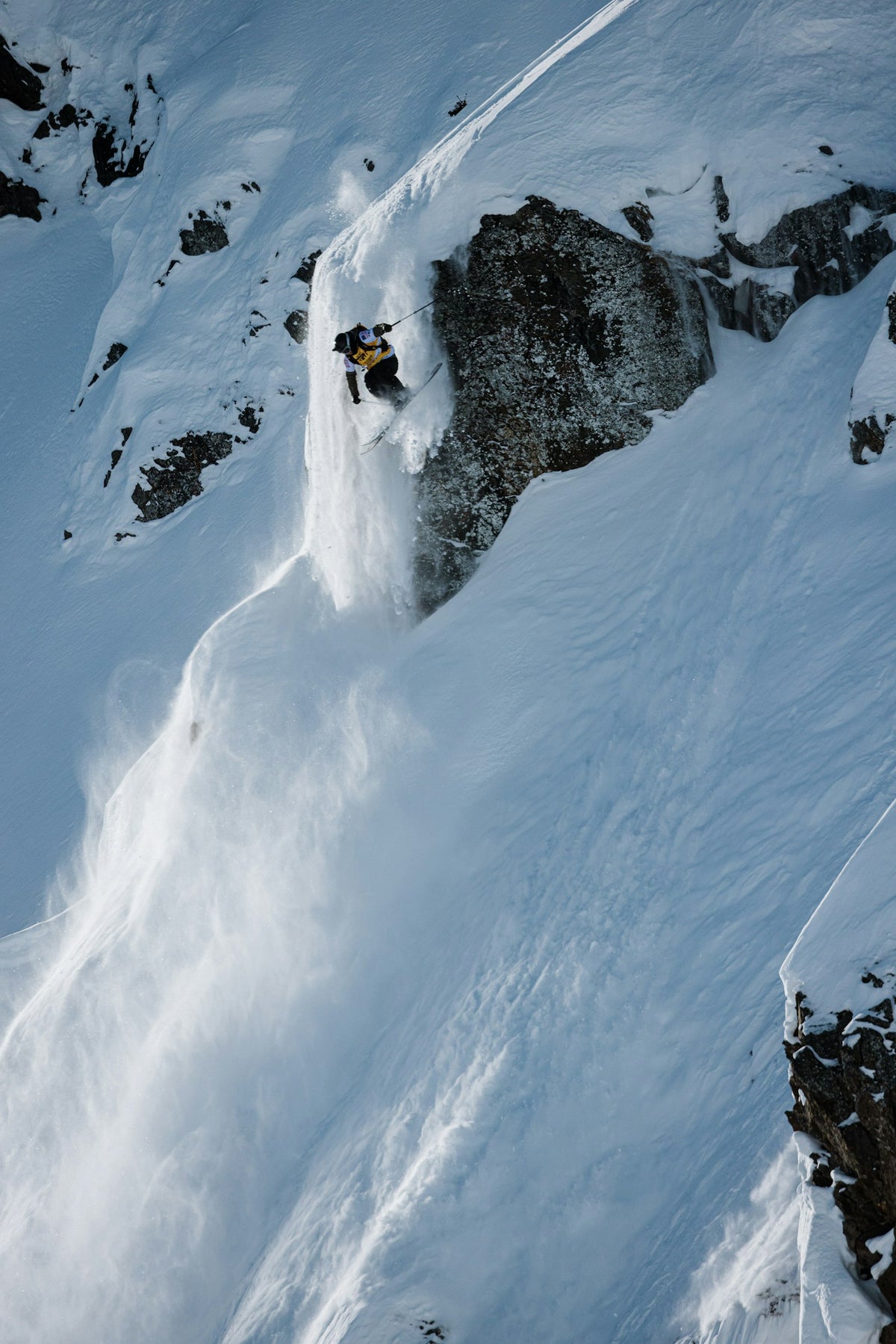 Skier dropping a cliff in Haines, Alaska, photographed by Jeremy Bernard at the 2026 Freeride World Tour